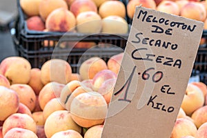 Peaches in street market Torrevieja, Spain photo