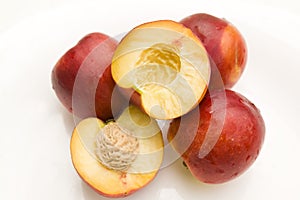 Peaches on white isolated background