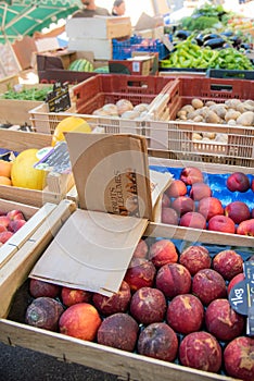 Peachs and vegetables on a market