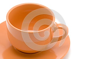 Peachy cup on white photo