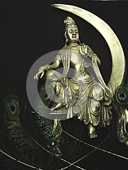 peacock feathers, crescent moon, meditating buddha PEACE