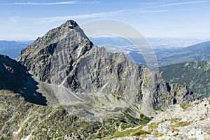 The peak is called the national mountain of Slovaks - Krivan Krywan. View of the summit along with one of the side ridges. photo