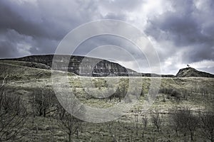 British countryside landscape,dark and cloudy sky over mountain.