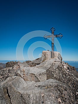 The peak of the highest mountain in Slovakia, Gerlachovsky Stit, on which a cross rises