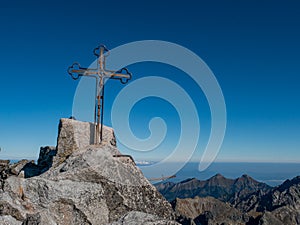 The peak of the highest mountain in Slovakia, Gerlachovsky Stit, on which a cross rises