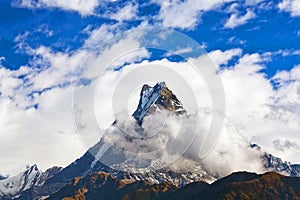 Peak Machapuchare over clouds, Nepal