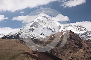 Peak of Mount Kazbek in sunny weather