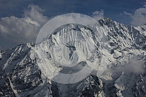 Peak of mount Ponggen Dopchu. View from Tserko Ri, Langtang valley, Nepal. Cloudy spring day.