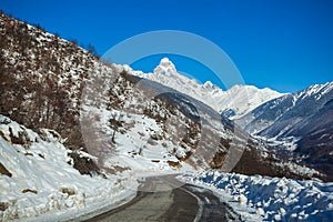 Peak of mount Ushba in Caucasus Mountains, Svanetia region in Ge
