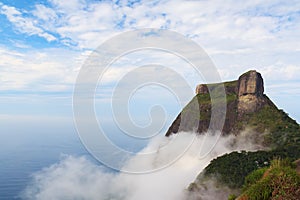 Peak Mountain Pedra da Gavea in clouds sky sea ocean, Rio de Jan photo