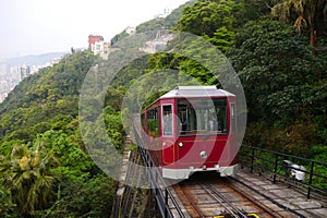 Peak tram driving across the peak in Hong Kong