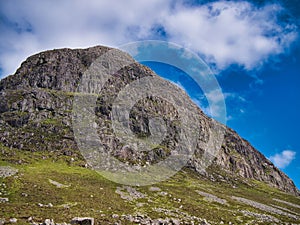 The peak of Uisgnabhal Mor towers over Glen Meavaig, home of the North Harris Eagle Observatory in the Outer Hebrides, Scotland