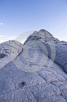 The peak of a unique, textured white rock formation in the Vermillion Cliffs National Monument