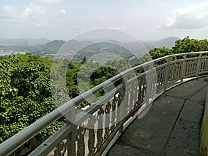 Peak view from sajjangarh palace  hils and sky in udaipur rajasthan in india