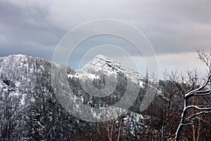 Peaks of the Apuan Alps covered with soft white winter snow