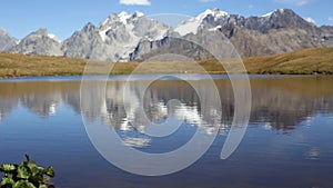 Peaks of the Caucasus reflecting in water