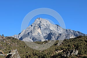 Peaks of mountains in Nepal in the summer without snow