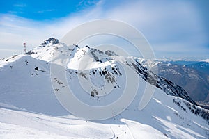 peaks of snow-capped mountains in winter