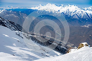 peaks of snow-capped mountains in winter