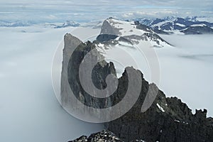The peaks of Trollveggen in fog