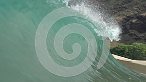 Peaky wave in Hawaii shorebreak