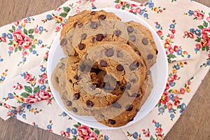 Peanut butter chocolate chip cookies on a white plate