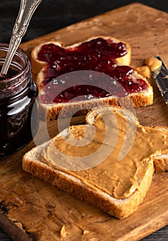 Peanut Butter and Jelly Sandwich on a Wooden Kitchen Counter
