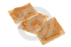 Peanut Butter Spread on Seeded Crackers