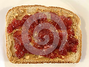 Peanut Butter and Strawberry Jam on Whole Wheat