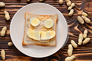 Peanut butter toast with banana slices.