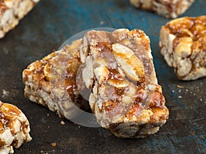 peanut chikki Indian sweet made of peanuts and jaggery photo