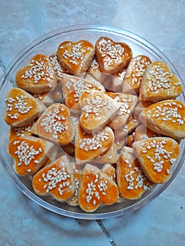 peanut cookies decorated with sesame seeds