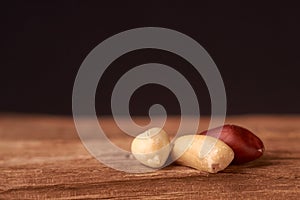 peanut hill Deep fried peanuts over rustic wicker background. emptiness place. Space for text. copyspace