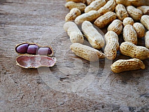 Peanut open shell on group of peanuts close shell