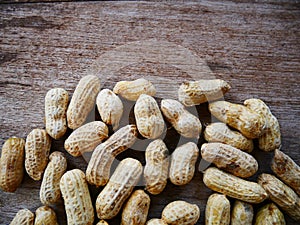 Peanut open shell on group of peanuts close shell