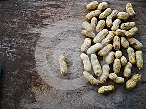 Peanut open shell on group of peanuts close shell