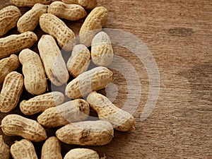 Peanut open shell on group of peanuts close shell