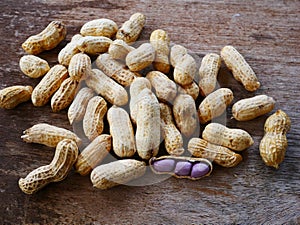 Peanut open shell on group of peanuts close shell