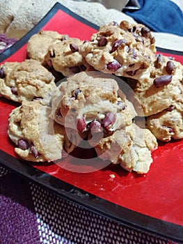 Peanuts cookies on red plate