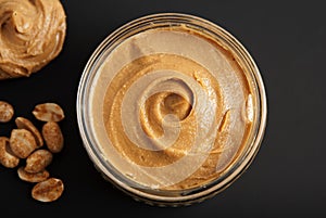 Peanuts and Fresh Peanut Butter Isoalted Black Background Protein Super Food Snack