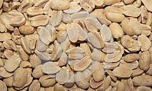 The peanuts are raw and peeled.Peanuts are split.Nuts are peanuts background