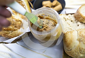 Peanuts in the shape of sweets, pacoca, cornmeal cake and peanut butter on bread