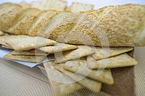 Peanuts in the shape of sweets, pacoca, cornmeal cake and peanut butter on bread