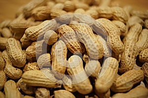 Peanuts in the shell  haphazardly placed photo