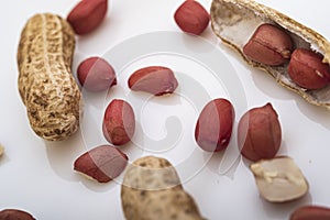 Peanuts in shell isolated on white background. Heap of peanuts