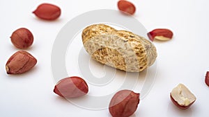 Peanuts in shell isolated on white background. Heap of peanuts
