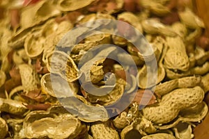 Peanuts and shells food background texture.