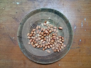 Peanuts on the wood plate