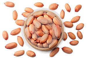 peanuts in wooden bowl isolated on white background top view