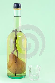 Pear brandy with pear in the bottle